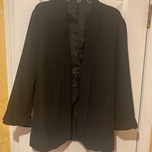 Very beautiful blazer. Size 12 black collar.